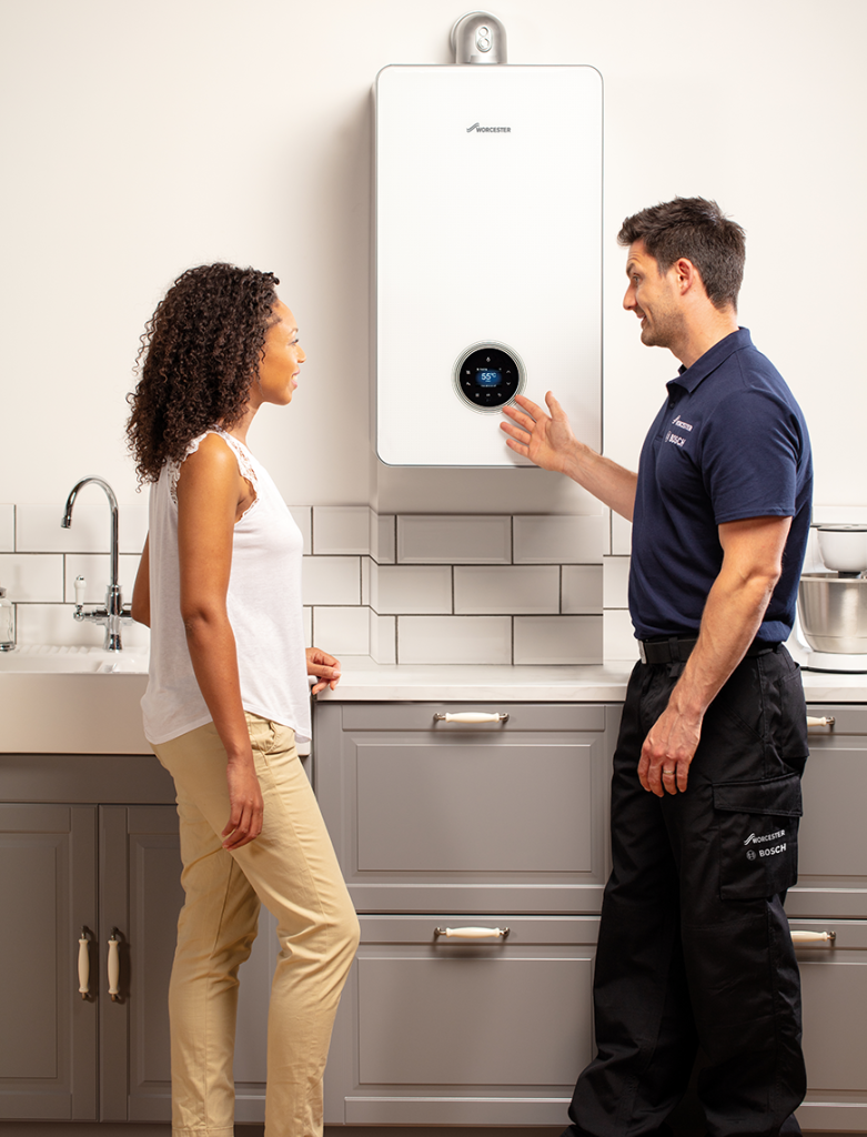 Couple in kitchen at boiler